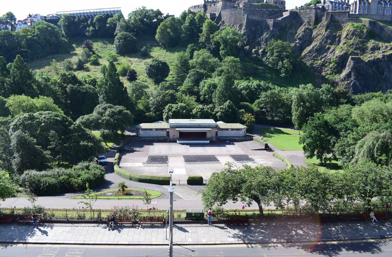 View of the Ross Bandstand, West Princes Street Gardens and backdrop of Edinburgh Castle.