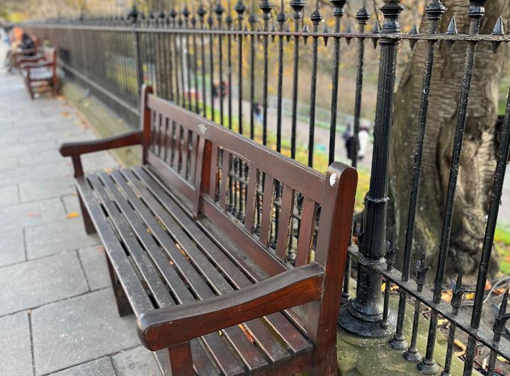 Photo of existing wooden benches on Princes Street's south pavement